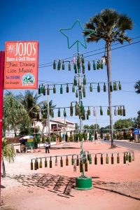 christmas tree made of beer bottles in gambia